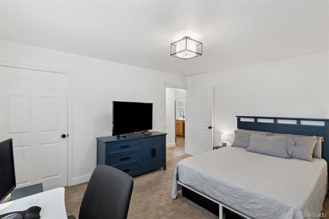 7654 Crestone Peak Trl, Colorado Springs, CO 80924 - bedroom with light colored carpet and baseboards