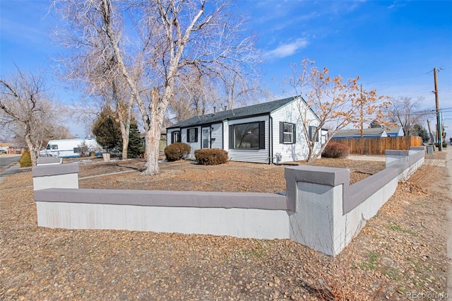 exterior space featuring a fenced front yard