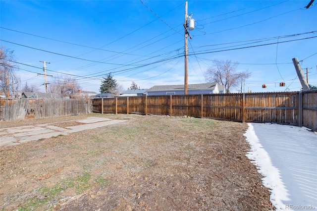 view of yard featuring a fenced backyard