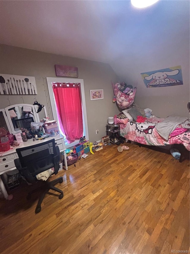 206 Lyell St, Monte Vista, CO 81144 - bedroom featuring wood finished floors
