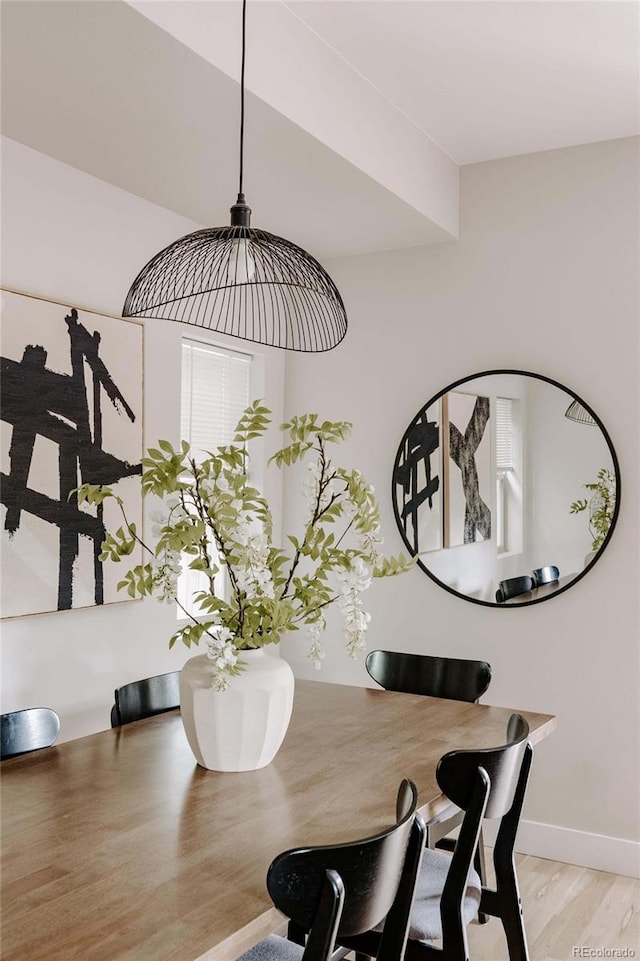 dining area featuring light hardwood / wood-style flooring and a wealth of natural light