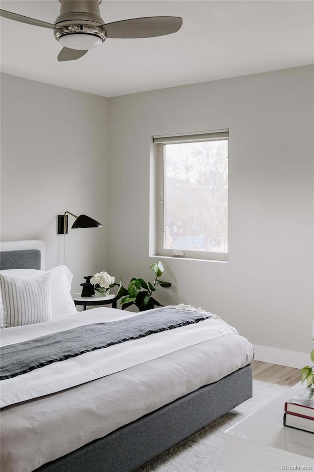 bedroom featuring ceiling fan