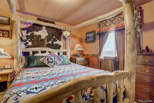 41215 Alta Vista Rd, Ramah, CO 80832 - bedroom with a wainscoted wall