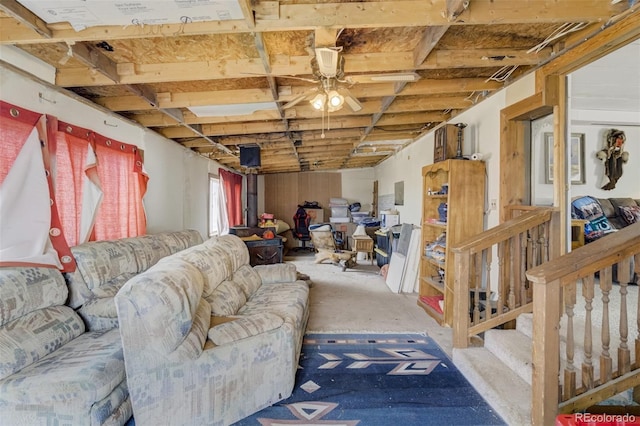 41215 Alta Vista Rd, Ramah, CO 80832 - basement with ceiling fan and stairs