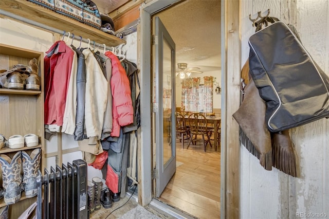 41215 Alta Vista Rd, Ramah, CO 80832 - spacious closet with a ceiling fan, radiator, and wood finished floors