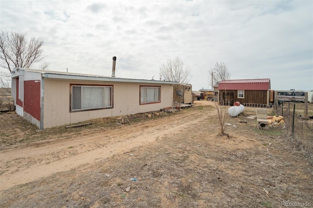 41215 Alta Vista Rd, Ramah, CO 80832 - rear view of property with metal roof and fence