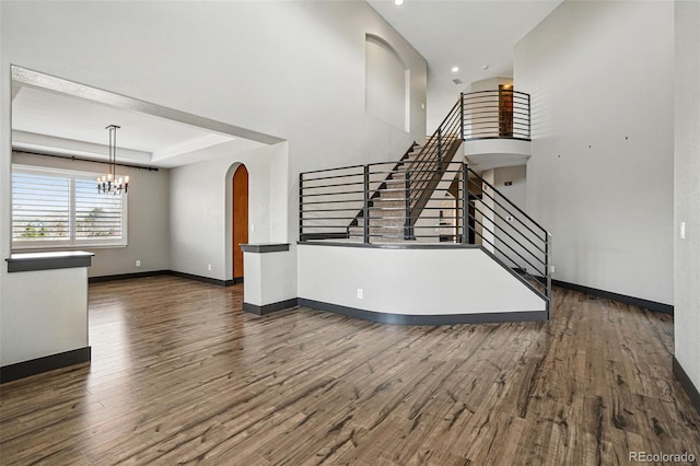 19423 W 52nd Dr, Golden, CO 80403 - interior space featuring baseboards, a tray ceiling, and wood finished floors