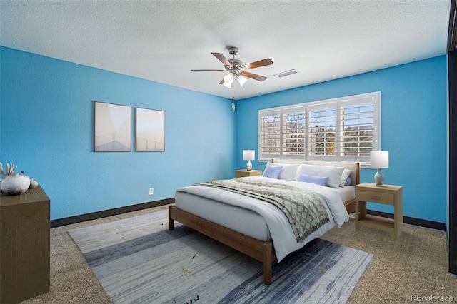 19423 W 52nd Dr, Golden, CO 80403 - bedroom with a textured ceiling, baseboards, and visible vents