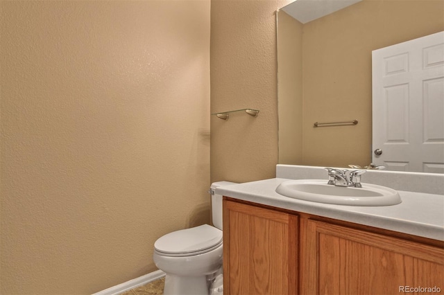 245 Homestead Way, Brighton, CO 80601 - bathroom with vanity and a textured wall