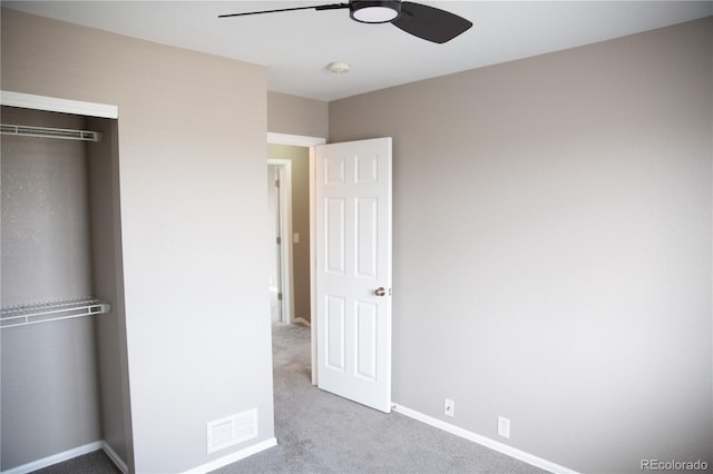 245 Homestead Way, Brighton, CO 80601 - unfurnished bedroom with carpet, a closet, and a ceiling fan