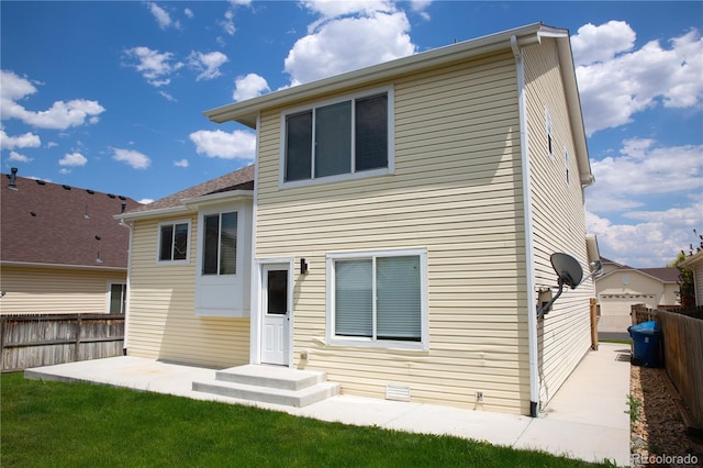 245 Homestead Way, Brighton, CO 80601 - back of property featuring a patio area