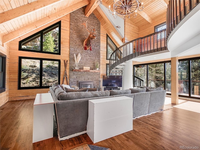24 Pine Valley Rd, Evergreen, CO 80439 - living room featuring high vaulted ceiling, a chandelier, wooden ceiling, wood finished floors, and stairway
