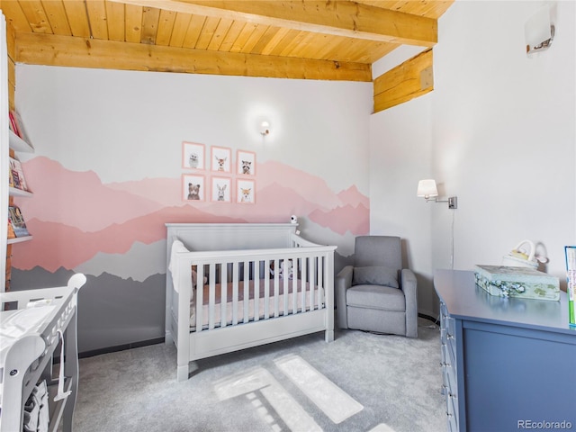 24 Pine Valley Rd, Evergreen, CO 80439 - bedroom featuring carpet flooring, beamed ceiling, wooden ceiling, and a crib