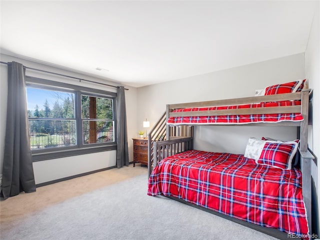 24 Pine Valley Rd, Evergreen, CO 80439 - carpeted bedroom featuring baseboards