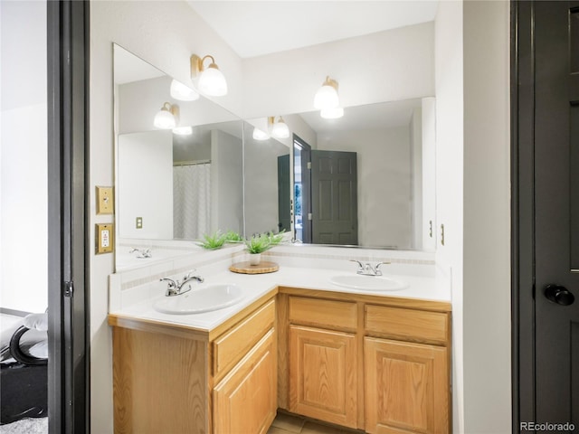 24 Pine Valley Rd, Evergreen, CO 80439 - bathroom with a sink and double vanity