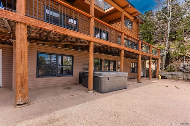 24 Pine Valley Rd, Evergreen, CO 80439 - exterior space with a hot tub and a wooden deck