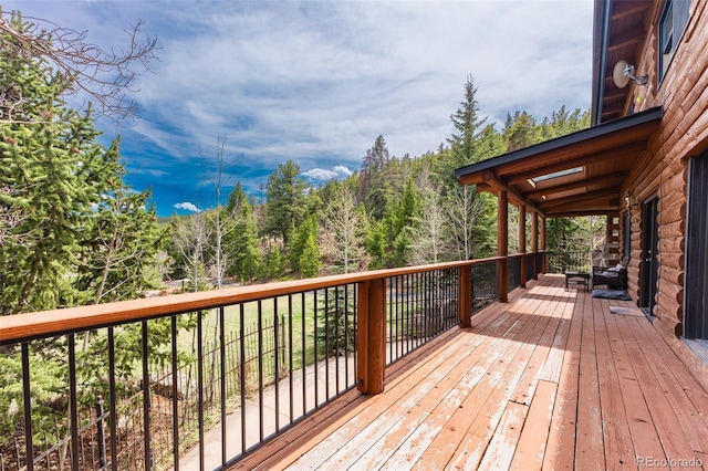 24 Pine Valley Rd, Evergreen, CO 80439 - wooden terrace with a wooded view