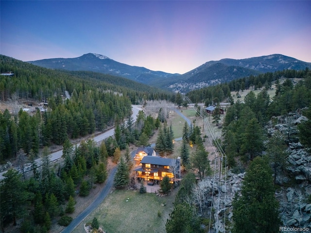 24 Pine Valley Rd, Evergreen, CO 80439 - aerial view with a view of trees and a mountain view