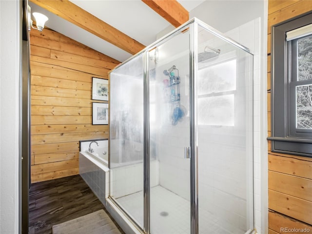 24 Pine Valley Rd, Evergreen, CO 80439 - full bathroom with wood walls, wood finished floors, a shower stall, and a bath