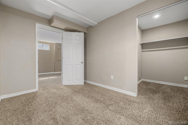 unfurnished bedroom with baseboards and carpet floors