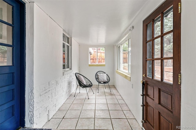 foyer featuring light tile patterned floors