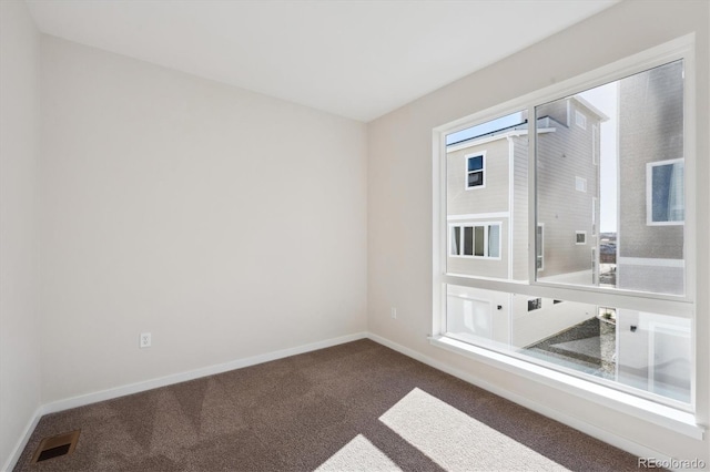 view of carpeted spare room