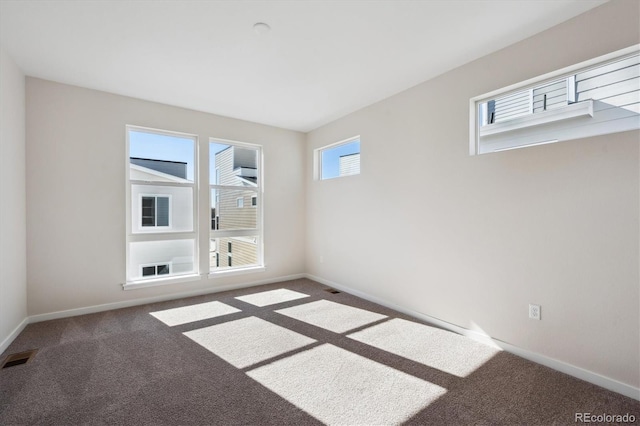 view of carpeted spare room