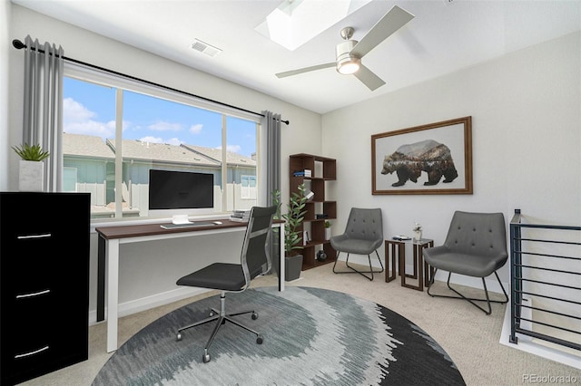 5018 S Prince Pl, Littleton, CO 80123 - office featuring carpet flooring, a skylight, and ceiling fan