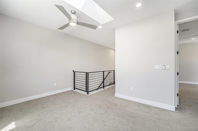 5018 S Prince Pl, Littleton, CO 80123 - carpeted empty room with a skylight, recessed lighting, and a ceiling fan