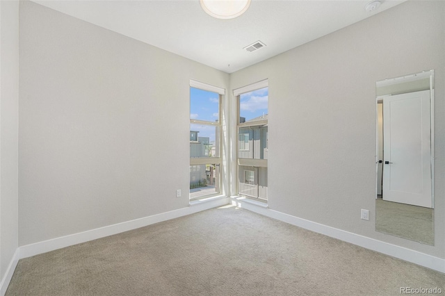 5018 S Prince Pl, Littleton, CO 80123 - carpeted spare room featuring baseboards and a smoke detector
