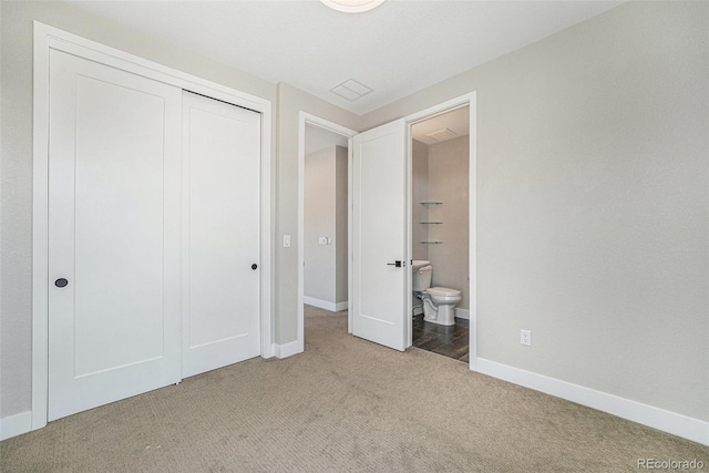 5018 S Prince Pl, Littleton, CO 80123 - unfurnished bedroom featuring carpet flooring, a closet, and ensuite bathroom