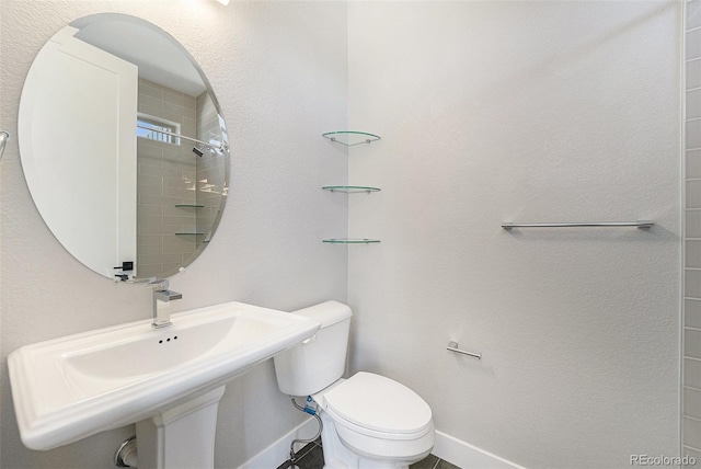 5018 S Prince Pl, Littleton, CO 80123 - bathroom featuring toilet and a shower