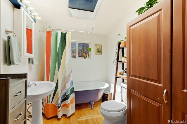 1318 S 25th St, Colorado Springs, CO 80904 - full bath with a skylight and a freestanding tub