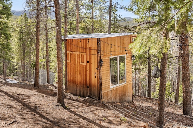 8451 London Ln, Conifer, CO 80433 - view of shed with a mountain view and a wooded view