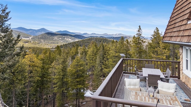 8451 London Ln, Conifer, CO 80433 - view of mountain background featuring a heavily wooded area