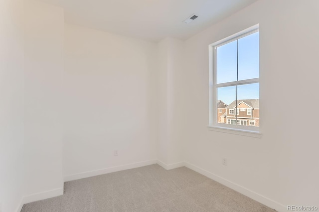 view of carpeted spare room