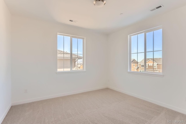 view of carpeted spare room