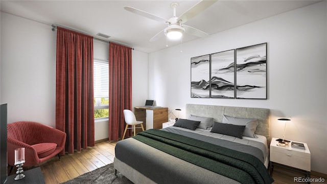 bedroom with hardwood / wood-style flooring and ceiling fan