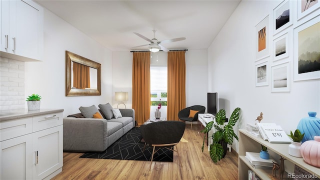 living room with light hardwood / wood-style flooring and ceiling fan