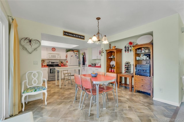 dining room with an inviting chandelier