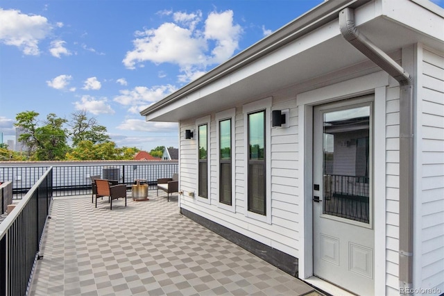 exterior space featuring a balcony