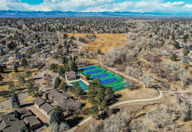 birds eye view of property featuring a mountain view