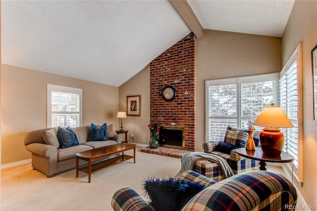 living room with vaulted ceiling with beams, a textured ceiling, a brick fireplace, and carpet flooring