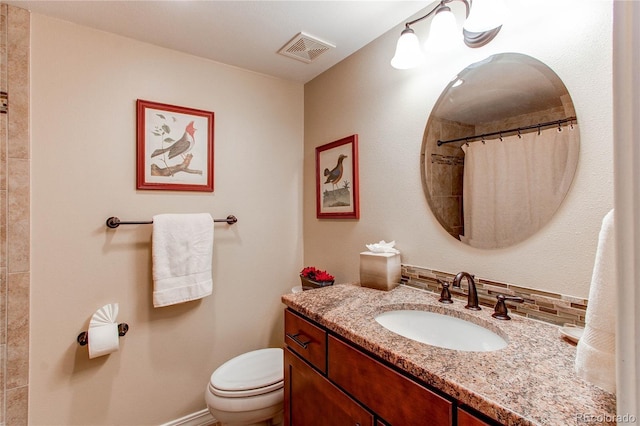 full bathroom with visible vents, backsplash, a shower with shower curtain, toilet, and vanity