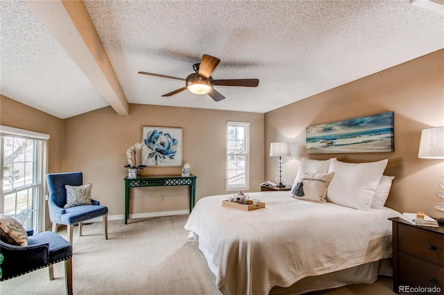 bedroom with light carpet, vaulted ceiling with beams, baseboards, and multiple windows