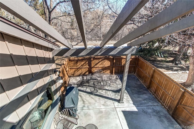 view of patio / terrace with fence and outdoor dining area