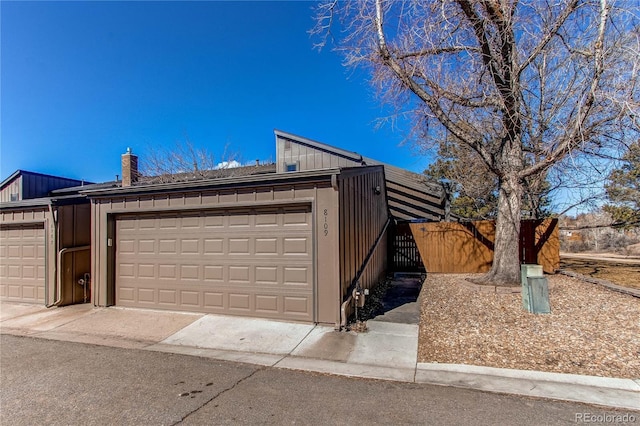 garage with fence