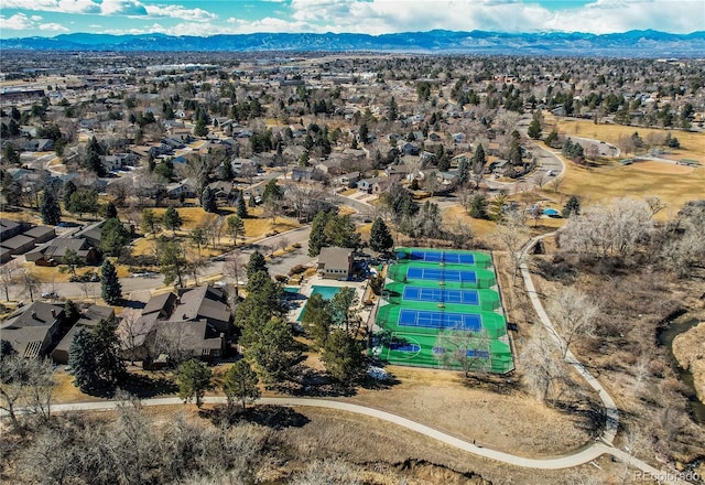 drone / aerial view with a residential view and a mountain view