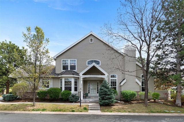 2032 W Nantucket Ct, Littleton, CO 80120 - view of front of property featuring a chimney