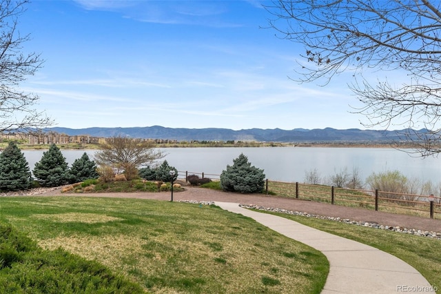 2032 W Nantucket Ct, Littleton, CO 80120 - water view with fence and a mountain backdrop